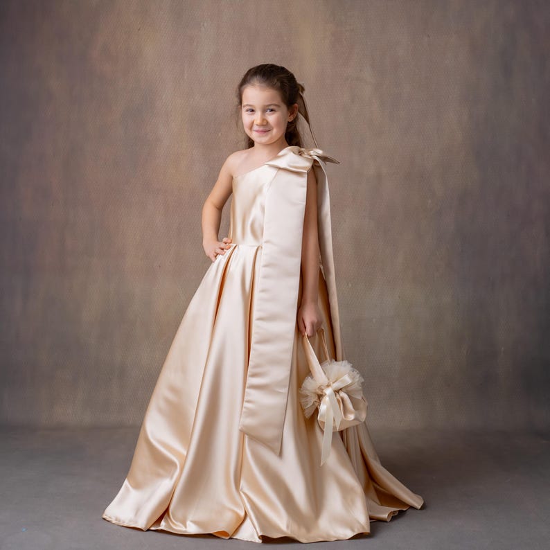 Champagne Satin One-Shoulder Flower Girl Dress with Bow & Personalized Bag Wedding Gown